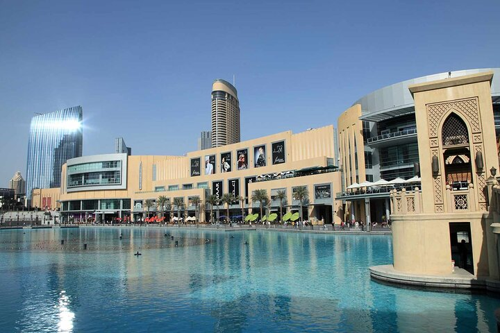 Explore Dubai's stunning skyline and architectural wonders while relaxing in luxurious comfort. Marvel at iconic landmarks all from the plush seats of a Mercedes-Benz Viano.